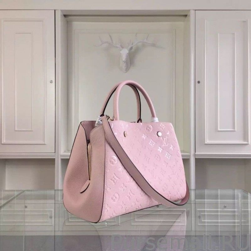 Montaigne MM Monogram Empreinte M41394