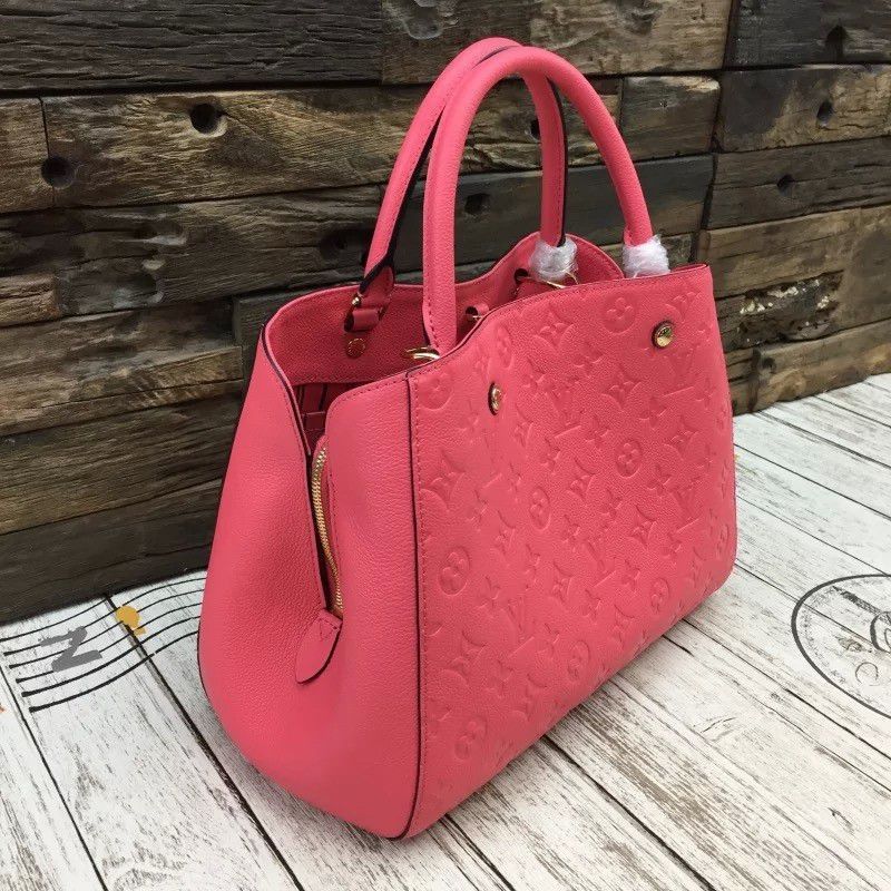 Montaigne MM Monogram Empreinte M41308