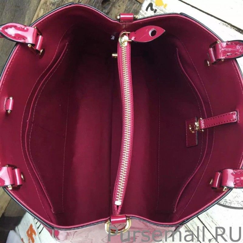 Montaigne MM Monogram Vernis M50167