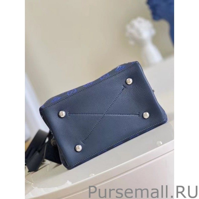 Muria Bag In Blue Mahina Leather M59554