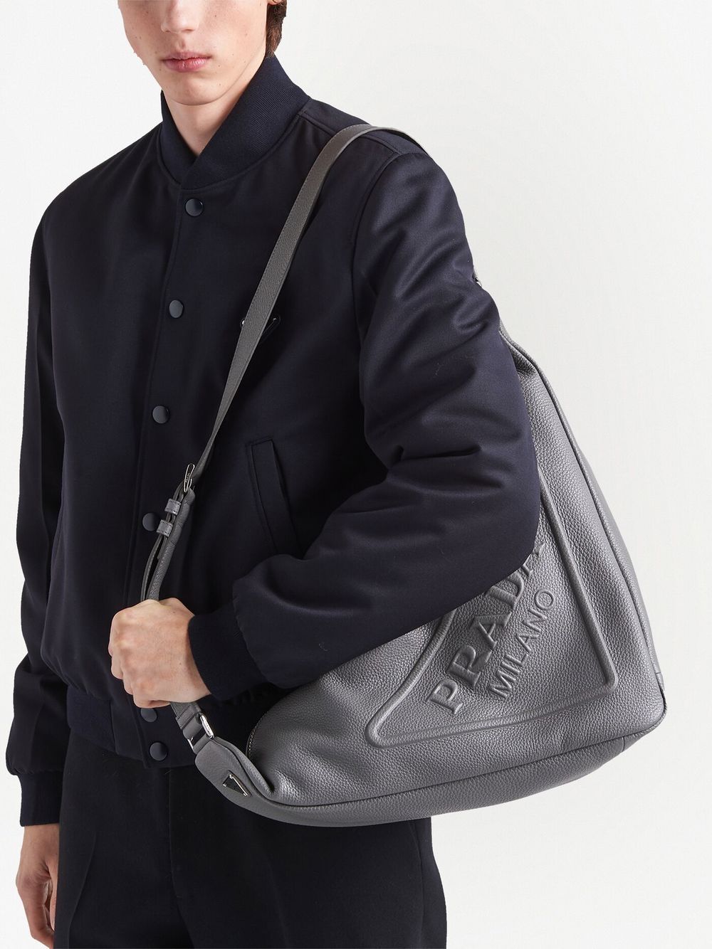 Pra*a triangle leather messenger bag