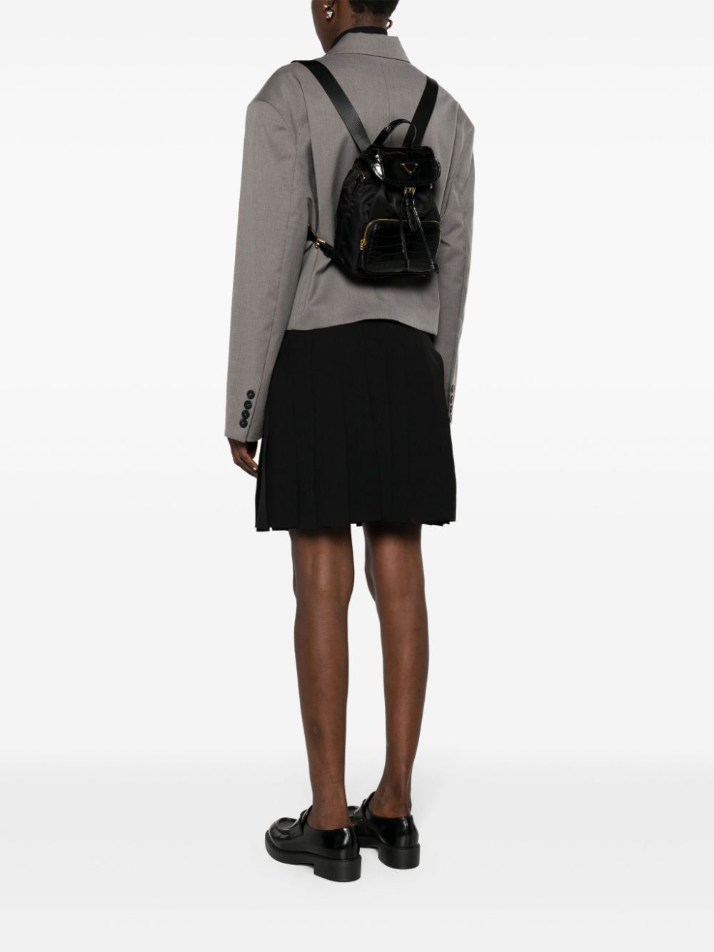 Pra*a logo-plaque leather backpack