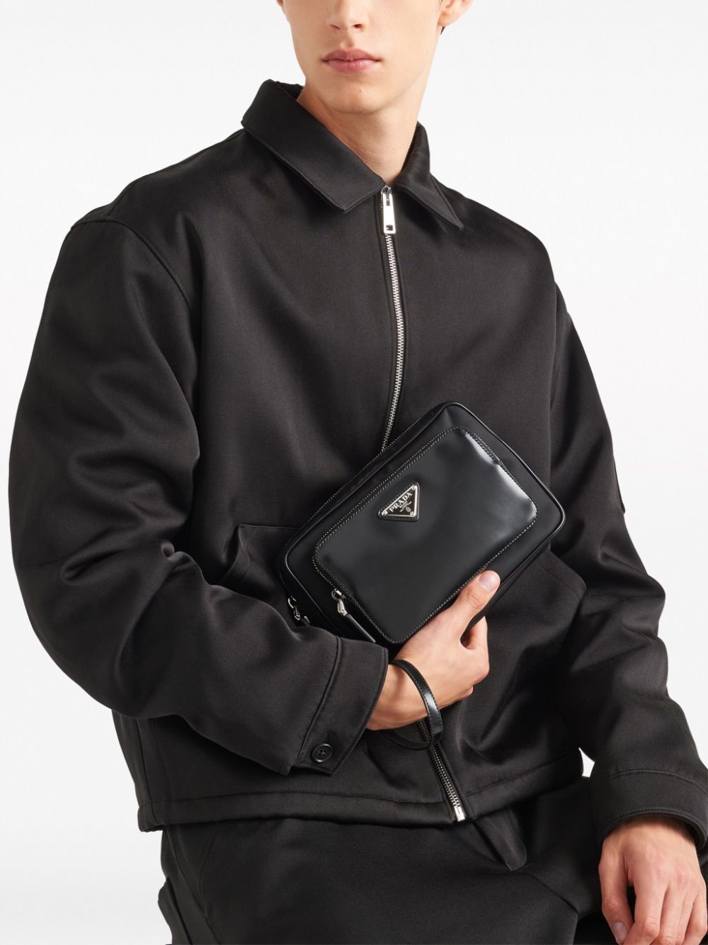 Pra*a triangle-logo panelled clutch bag