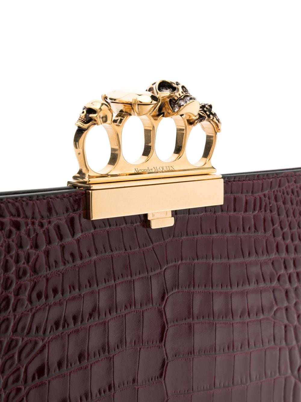 Alexander McQueen The Knuckle embossed clutch bag