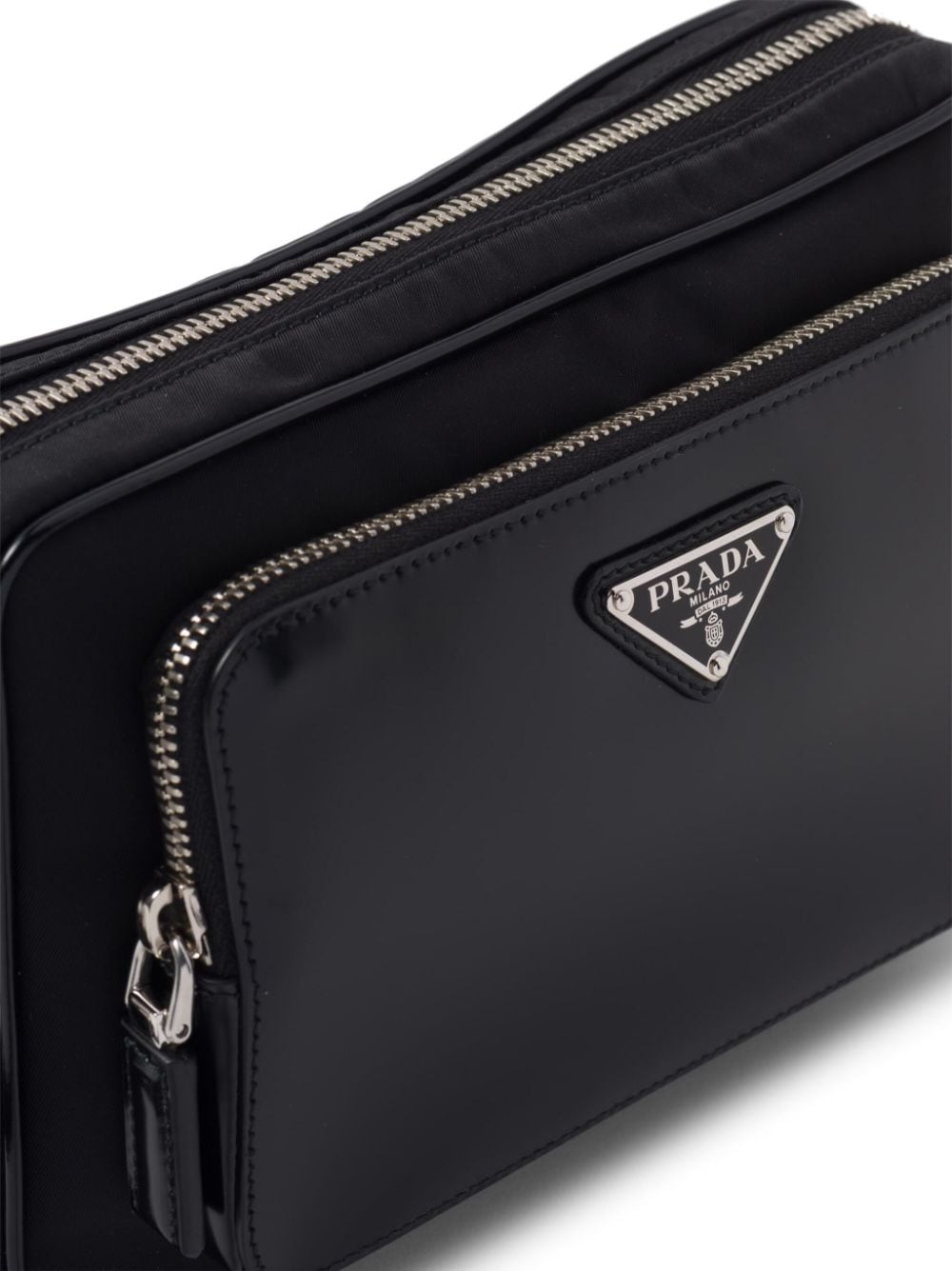Pra*a triangle-logo panelled clutch bag