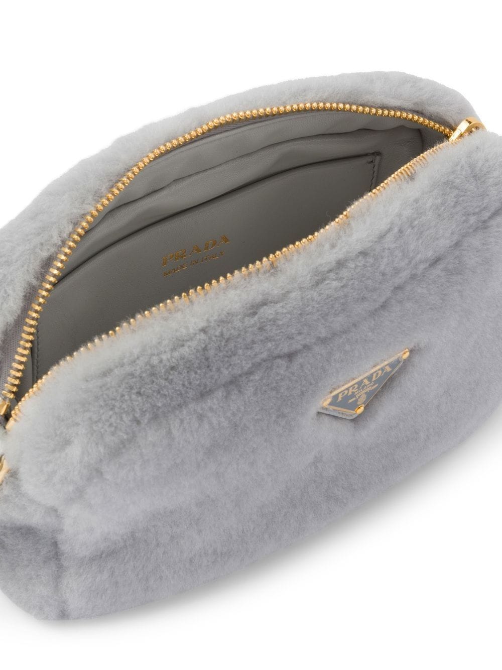 Pra*a triangle-plaque shearling shoulder bag