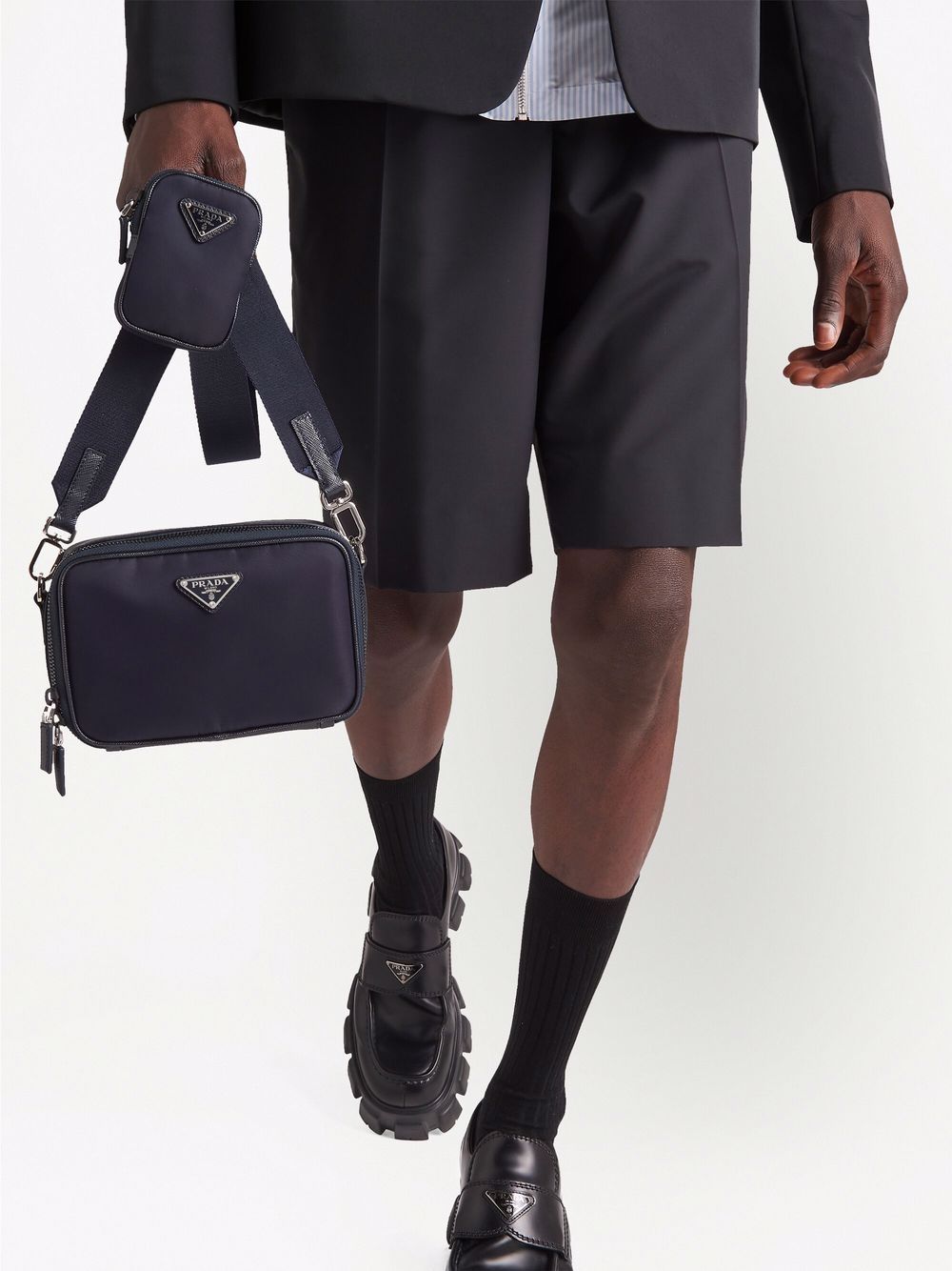 Pra*a triangle-logo brique messenger bag