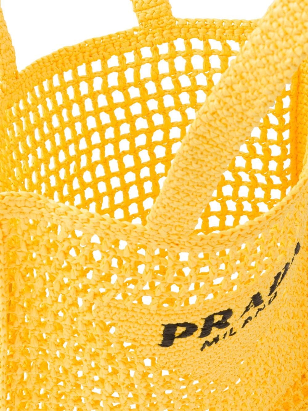 Pra*a woven-logo raffia tote bag